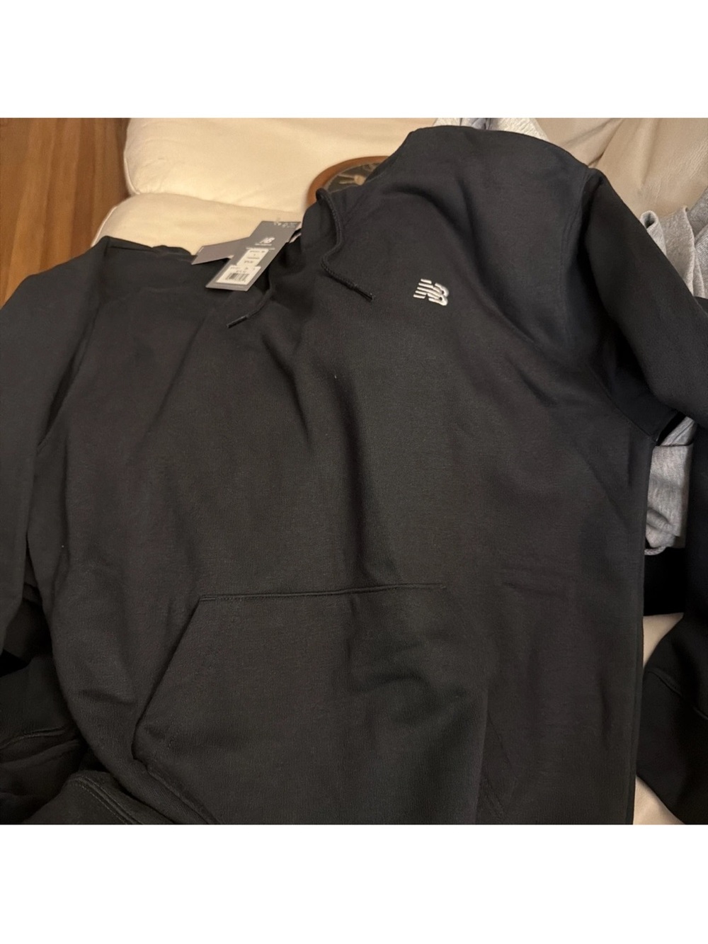 New Balance Black Hoodie with Small White Logo